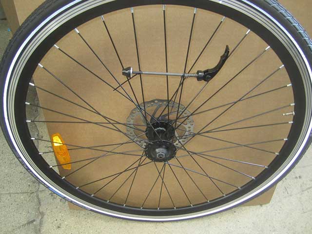 Locate the quick release on the front wheel and remove